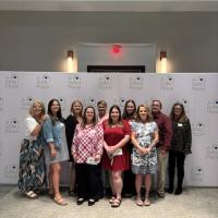 Bug-N-A-Rug employees at the 2026 A Safe Place luncheon