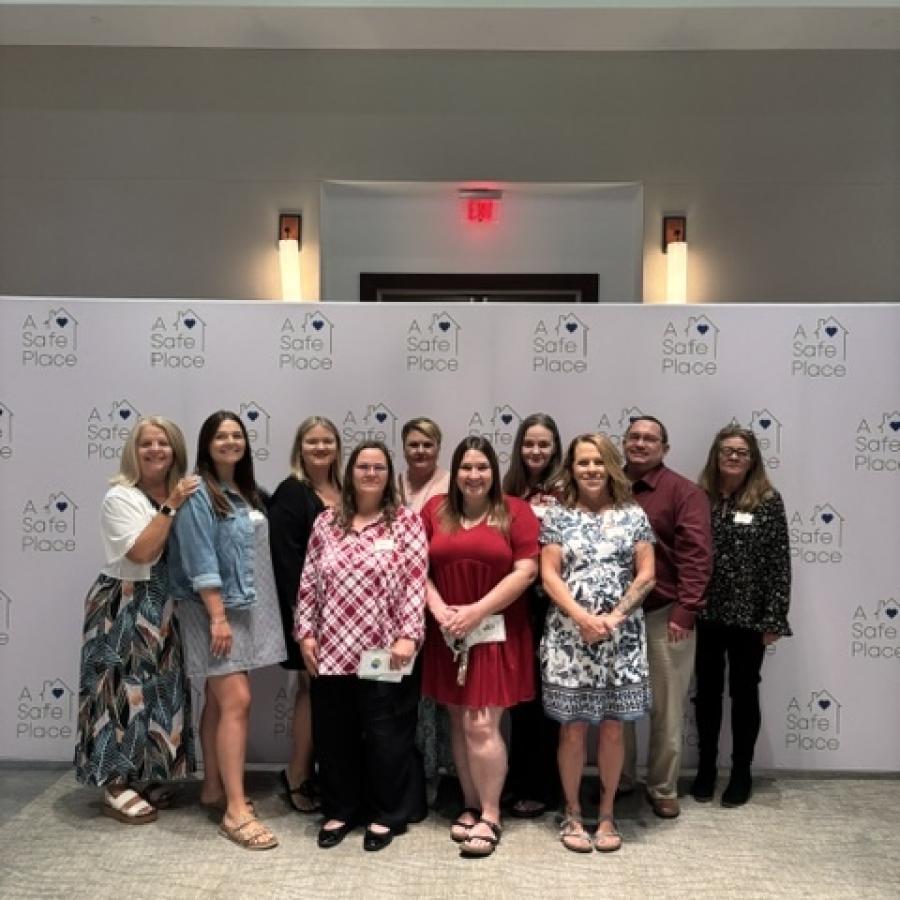 Bug-N-A-Rug employees at the 2026 A Safe Place luncheon